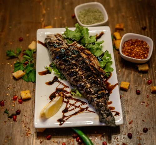 კალმახი შემწვარი მაყალზე